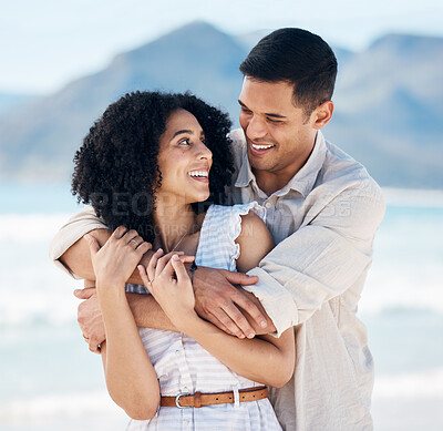 Buy stock photo Marriage, hug and couple with beach vacation, romance and travel with bonding, relationship and loving together. Romantic, man and woman embrace, seaside holiday and care with adventure and affection