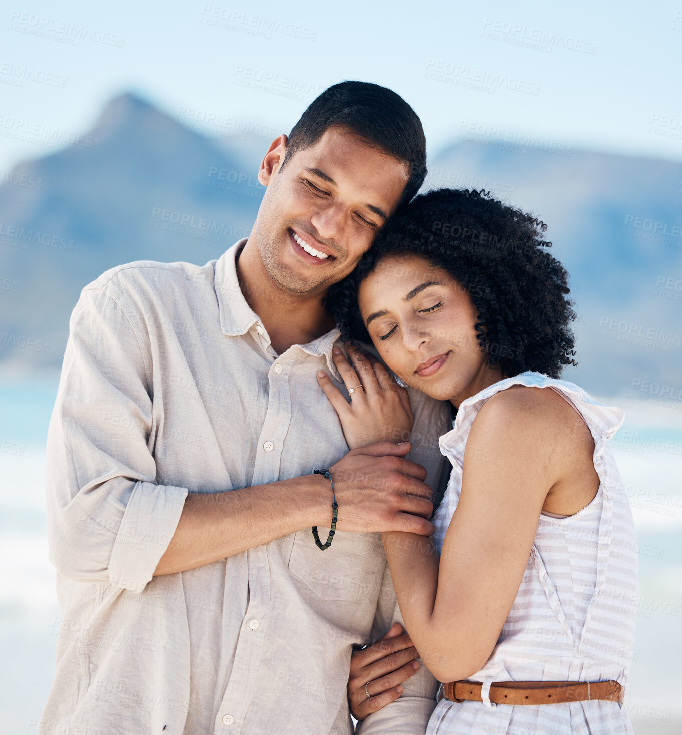 Buy stock photo Beach, marriage and couple with love, hug and relationship with romance, bonding and loving together. Vacation and Romantic, man and woman embrace, seaside holiday and care with adventure and smile