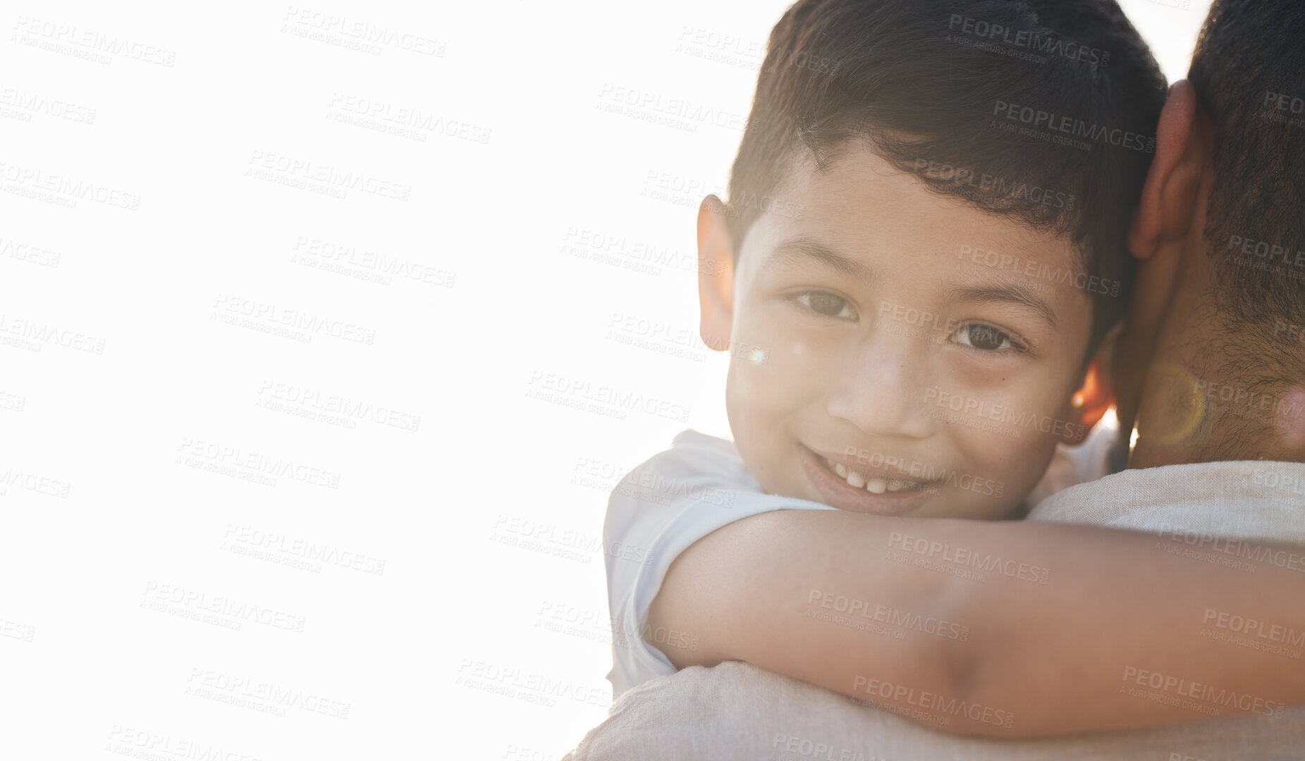 Buy stock photo Boy, father and portrait with holding, space and smile outdoor with mockup, light and lens flare in summer. Dad, young child and happy with hug, vacation or holiday in bright sunshine for bonding