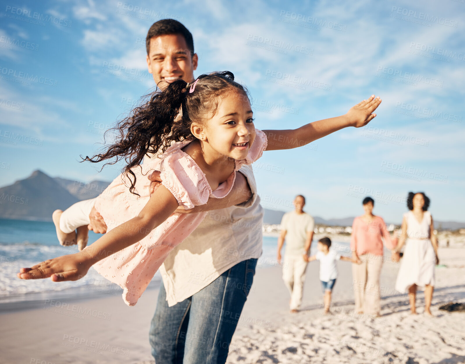 Buy stock photo Happy, beach and dad doing airplane with kid having fun on family vacation, adventure or holiday. Travel, smile and young father playing with his girl child by the ocean on a weekend trip together.