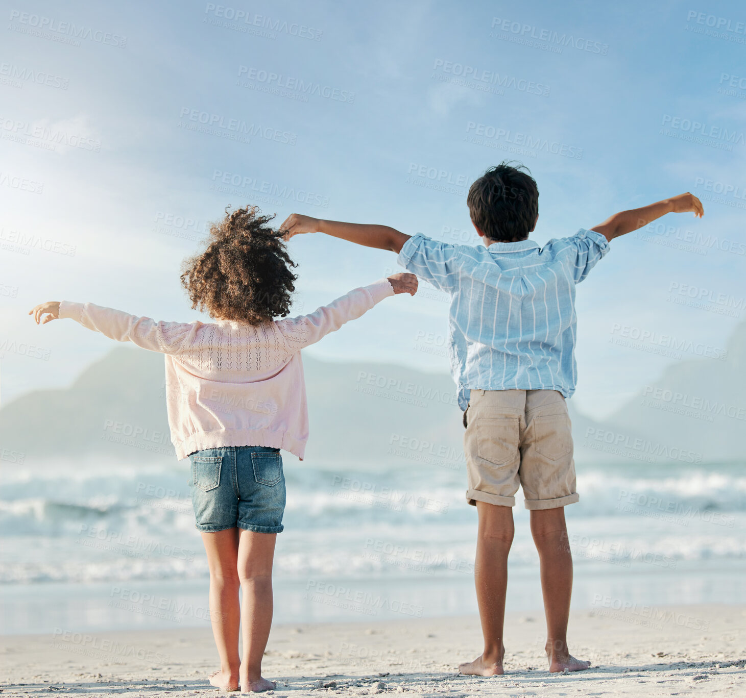 Buy stock photo Kids, playing and airplane on beach, vacation or freedom on holiday in summer in Brazil with ocean, blue sky and happiness. Girl, boy and children play game as plane to fly for fun, bonding together