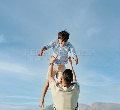 Buy stock photo Dad, son and blue sky, playing together in summer and tropical island holiday on beach in Hawaii. Fun, father and and son on ocean vacation with airplane games to relax, trust and support in nature.