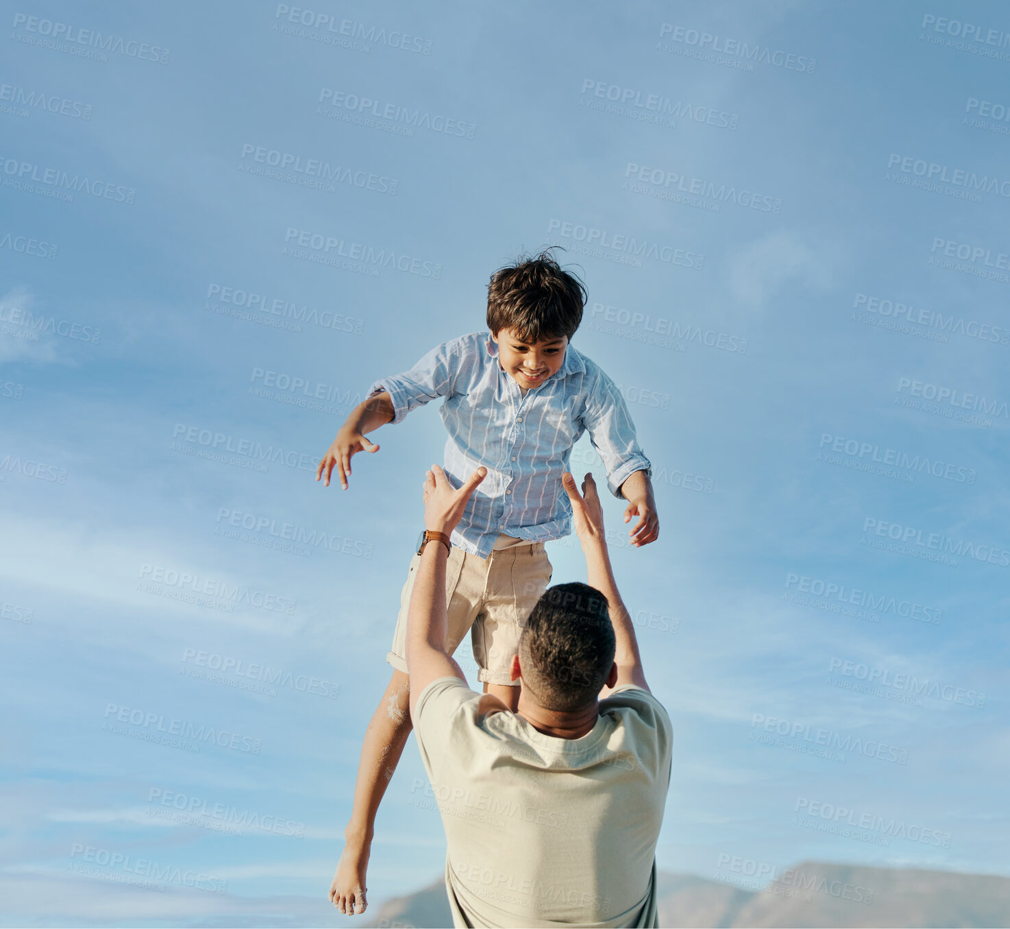 Buy stock photo Dad, son and blue sky, playing together in summer and tropical island holiday on beach in Hawaii. Fun, father and and son on ocean vacation with airplane games to relax, trust and support in nature.