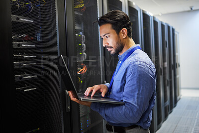 Buy stock photo Programming, data center and a man with a laptop for maintenance, cyber security and internet check. Coding, email and an Asian programmer typing on a computer for network or server analytics