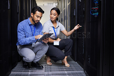 Buy stock photo People, talking and technician in server room with tablet for cybersecurity, update or team problem solving in data or coding. Engineer, teamwork and working with error in information technology code