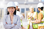 Construction worker, architecture and woman in engineering on site with team or group of workers and designers for property renovation. Smile, manager and portrait of project leader for building work