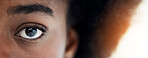 Eyes, closeup and portrait of African woman with mockup space for focus, thinking and vision. Banner, lens flare and zoom of half face of person looking for perception, awareness and intense stare