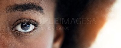 Buy stock photo Eyes, closeup and portrait of African woman with mockup space for focus, thinking and vision. Banner, lens flare and zoom of half face of person looking for perception, awareness and intense stare