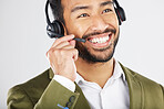 Happy asian man, call center and headphones in telemarketing, customer service or support against a white studio background. Friendly businessman, consultant or agent smile in online advice or help