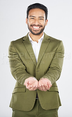 Buy stock photo Hands, open and portrait of business man in studio for charity, begging for support and help. Happy, corporate and person with gesture for donation, financial aid and investment on white background