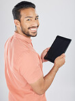 Smile, tablet and portrait of man search internet with technology isolated in a studio white background. Online, planning and young person or student working on connection or networking on app