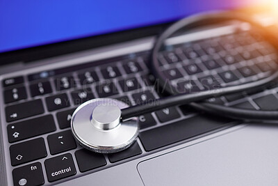 Buy stock photo Computer, stethoscope and online for medical advice, professional, or expert in healthcare, cardiology and care. Contact us, laptop and pc keyboard to search for nurse, doctor or health specialist