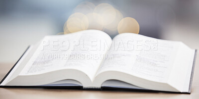 Buy stock photo Religion, christian and bible book on a table for praying, spiritual faith or holy worship to God. Closeup of open scripture for studying, reading prayer or story of Jesus Christ hope or gospel