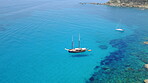 Boat on blue water, sailing in Croatia and summer sun on ocean holiday, relax in freedom and nature seascape. Yacht vacation, fun travel and tropical cruise on sea adventure to aerial island coast.