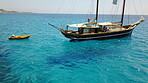 Boat, sailing in Croatia and sun on ocean holiday, relax in freedom and nature with clean blue water. Luxury yacht vacation, travel in summer and tropical cruise on sea adventure in island beach fun.