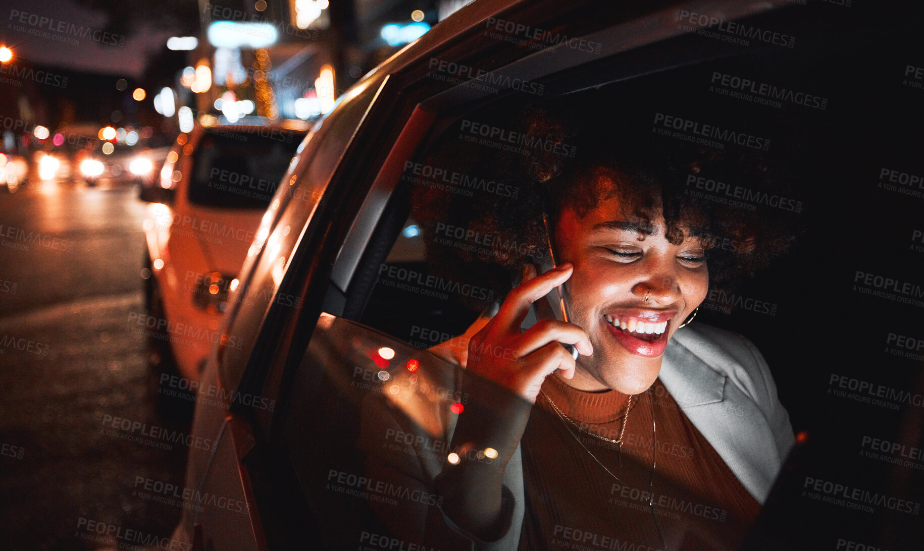 Buy stock photo Happy black woman, phone call and travel at night in city taxi for communication, conversation or networking. African female person smile, talking or late evening on mobile smartphone in discussion