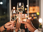 Cheers, wine and glasses with hands and business people at night, celebration of deadline target with collaboration. Alcohol drink, party and winning, toast and overtime with working late and meeting