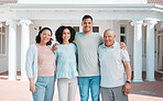 Happy, new home and portrait of generations of family standing outdoor of their property or real estate. Smile, love and young man and woman homeowners with their senior parents by a modern house.