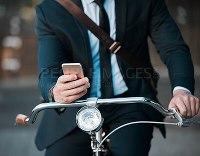 Business, phone in hands and bicycle outdoor for professional career, travel and transportation. Entrepreneur man with a bike and smartphone for internet communication, carbon footprint and journey