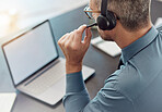 Businessman, laptop mockup and call center with headphones in customer service or telemarketing at office. Man, consultant or agent in online advice, help or contact us on computer at the workplace