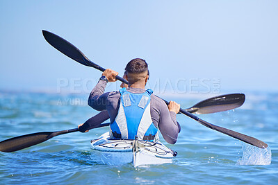 Water, man and woman in kayak from back and sports on lake, beach or river for exercise team. Ocean holiday, adventure and fitness, couple in canoe for training workout with teamwork and blue sky.