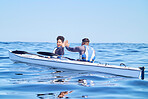 Water, man and woman in kayak with high five on lake, beach or river in sports challenge on vacation. Ocean holiday, adventure and fitness, happy couple in canoe for training success and winning race
