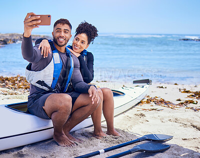 Buy stock photo Selfie, kayak and a couple on the beach to travel together for freedom, summer vacation or holiday. Relax, love or happy with a sports man and woman on a boat by the ocean or sea for adventure