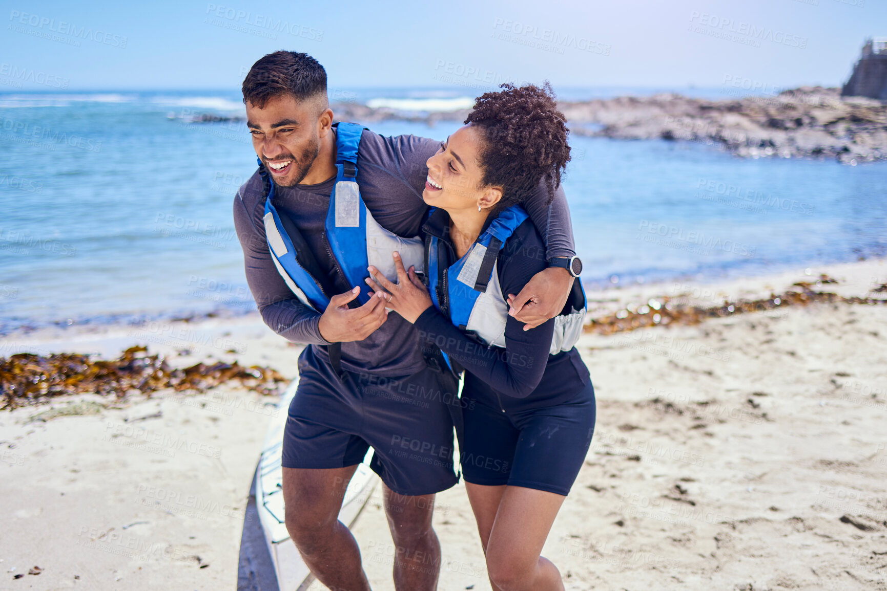 Buy stock photo Love, happy and kayak with a couple walking on the beach for travel, freedom or sports outdoor in nature. Smile, summer vacation or holiday with a man and woman by the sea or ocean for canoeing