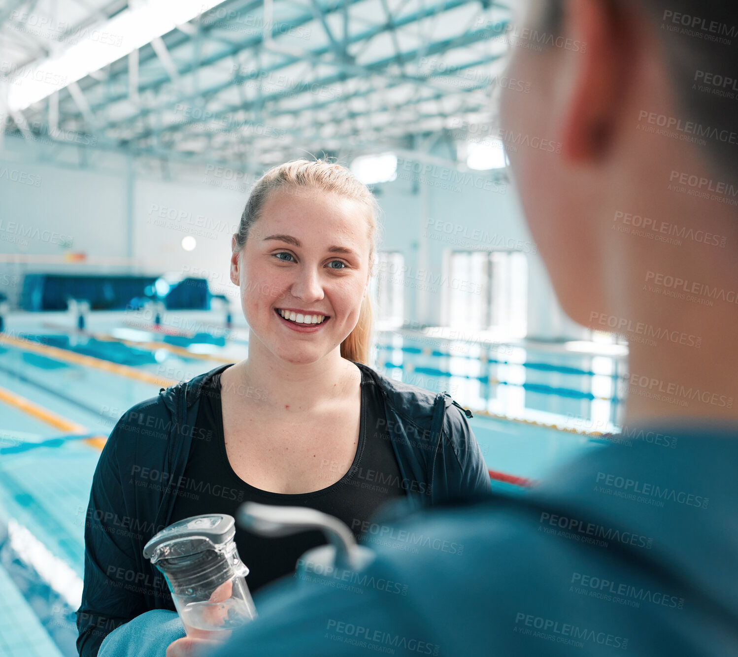 Buy stock photo Happy woman, friends and talking in swimming fitness, exercise or training together in sport at indoor pool. Female person or professional swimmer in happiness for discussion, competition or teamwork