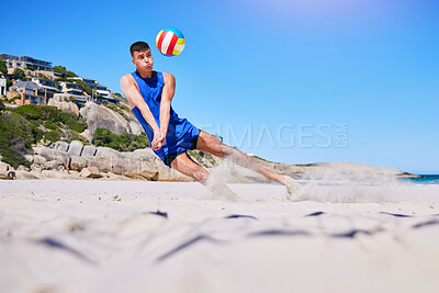 Beach volleyball, sports and man diving for ball, outdoor game or nature training for athletic challenge, action or match. Mockup blue sky, sand and player workout, activity and exercise in Australia