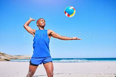 Buy stock photo Beach volleyball, sports and black man serve ball, play competition and athlete training in outdoor challenge. Blue sky, freedom and African player workout, exercise and start game, match or practice