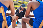 Beach, volleyball and coach with people for strategy, game plan and prepare for competition. Sports, fitness and man with athletes for training, exercise and workout for match, challenge and practice