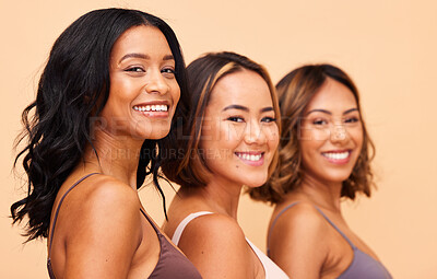 Buy stock photo Happy, women and portrait of skincare with diversity in beauty, studio or beige background and friends or group in salon. Natural, cosmetics and female models with confidence, pride and self care