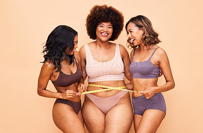 Buy stock photo Girl group, underwear and studio portrait with smile, transformation or diversity for beauty by background. Women friends, plus size and lingerie for inclusion, collaboration or stomach with pride