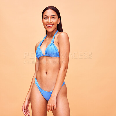 Buy stock photo Beauty, fashion and bikini with portrait of woman in studio for summer, tropical and wellness. Happy, vacation and body with person on beige background for confident, holiday and swimsuit style
