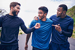 Happy, men and friends with smile for fitness, workout and running outdoor with a handshake. Exercise, training and sports with funny joke and comedy together in nature with an athlete with wellness
