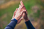 People, hands and high five for fitness, workout or exercise success, support or goals with teamwork in nature. Athlete, runner or sports group together for motivation, training target and hiking