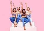 Fashion, stairs and excited women in studio for clothing promotion, discount and retail sale. Friends, bonding and people cheer on pink background in denim outfit, trendy clothes and casual style