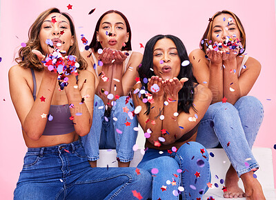Buy stock photo Blow, fashion and women in studio with confetti for celebration, clothing sale and discount. Beauty, diversity and female people on pink background for cosmetics, trendy clothes and denim outfit