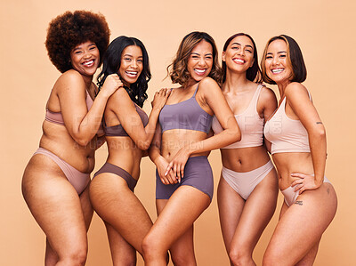 Buy stock photo Self love, diversity and portrait of women in studio in underwear for wellness, beauty and body positive. Lingerie campaign, natural and people on brown background for pride, skincare and inclusion