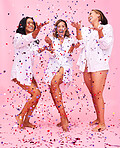Celebrate, friends and women in studio with confetti for party, underwear sale and discount. Body positive, diversity and people cheer on pink background for cosmetics, natural skincare and beauty