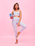 Yoga, portrait and woman with mat in studio for healthy body, fitness or focus on pink background. Sports model in tree pose for pilates training, holistic workout or balance for exercise performance