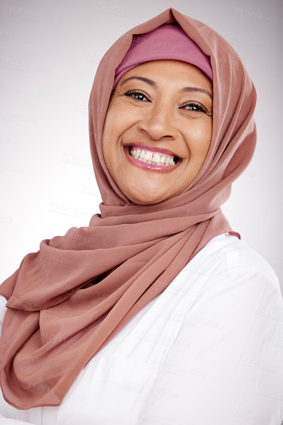 Buy stock photo Woman, muslim and face or happy portrait in hijab for fashion, culture and religion on a white background. Islamic or arabic person from Saudi Arabia and clothes, style or smile with faith in studio