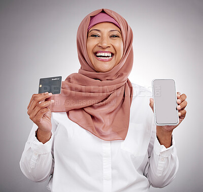 Buy stock photo Muslim woman, credit card and phone screen in fashion e commerce, online shopping or advertising mockup in studio. Islamic person in excited portrait and mobile banking or payment on white background