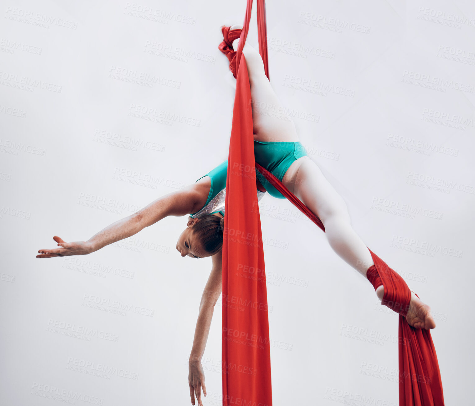 Buy stock photo Aerial, woman gymnast and training performance with stretching, flexibility split and athlete with white background. Workout, exercise and gymnastics with balance art and dance acrobat competition