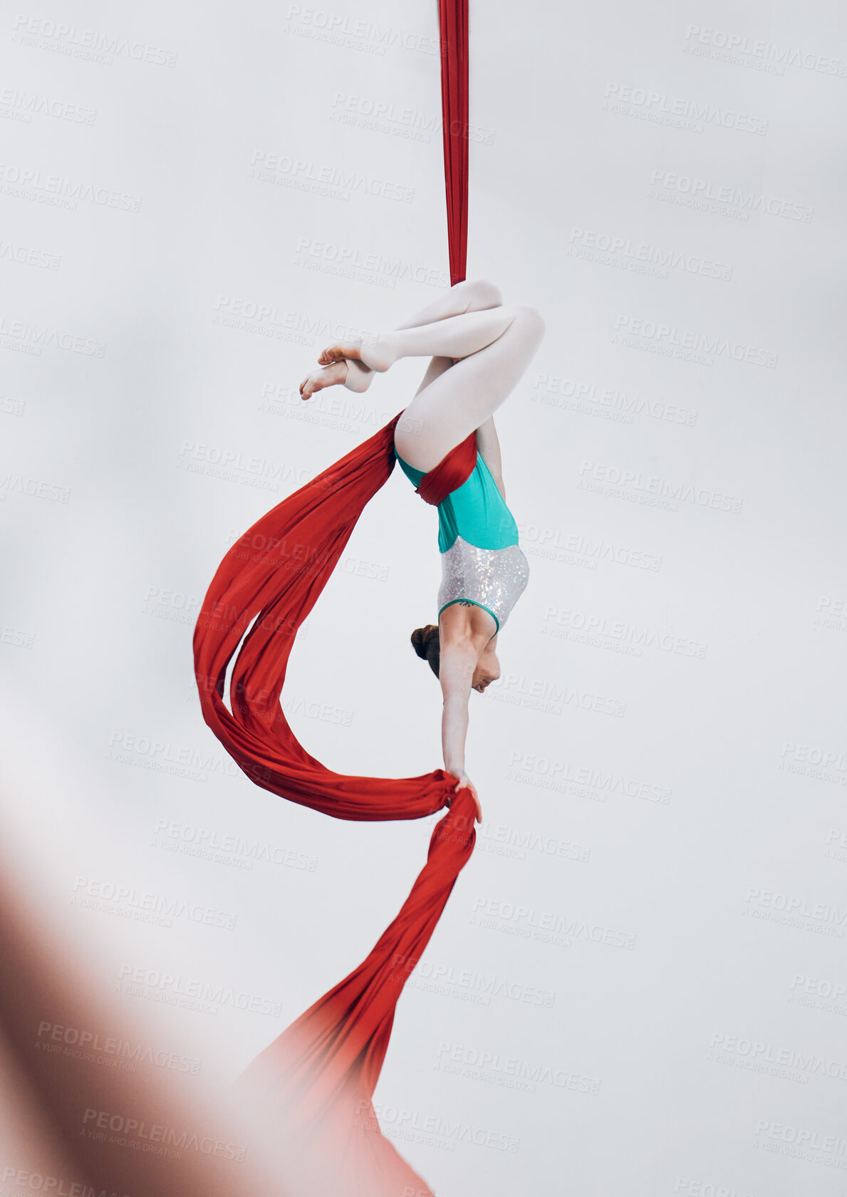 Buy stock photo Aerial, woman gymnast and ribbon for sport performance with flexibility and athlete with white background. Workout, exercise and gymnastics with balance, art and dance with acrobat competition