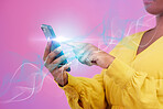 Woman hands, phone and network hologram, technology overlay and connection on a pink background. Person or online user press on social media, mobile Web 3.0 and internet speed with glow in studio