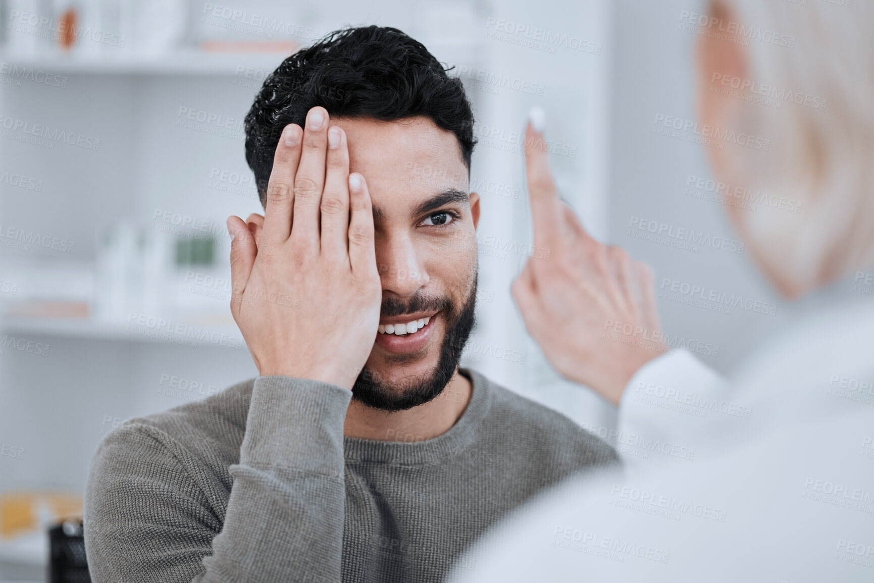 Buy stock photo Hand on eye, test and vision, optometrist and patient with health and eyecare, glasses and eyesight exam. Assessment, wellness and man with woman at optometry clinic, help and trust with visual