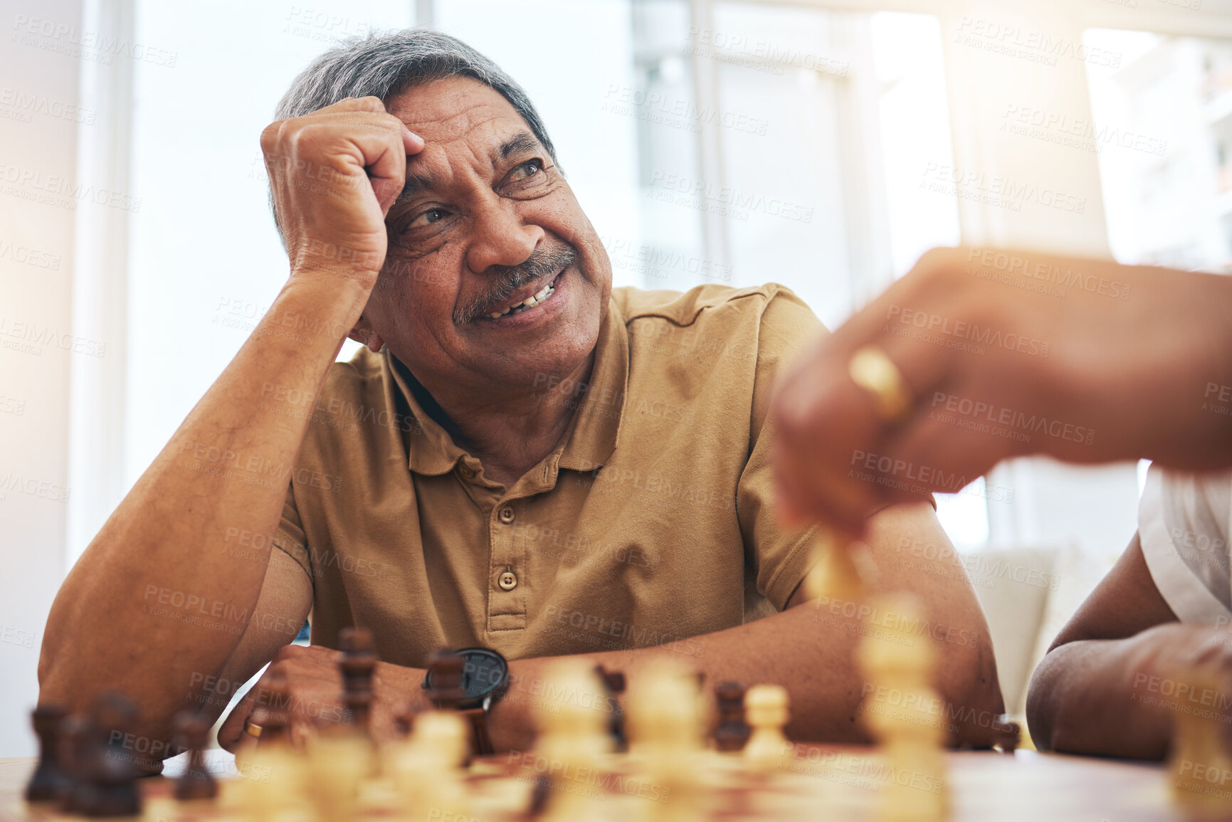 Buy stock photo Senior man, home and chess for competition, game and strategy with friend for focus and relax in living room. Thinking, elderly and person with board for challenge, planning and mindset in house