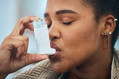 Buy stock photo Woman, face and breathe asthma pump for help with health risk, cough treatment and air at home. Closeup, sick african person and spray medicine inhaler for lungs, oxygen or wellness of emergency care